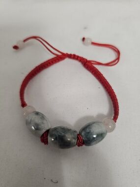 Jadeite Bead Bracelet On Red Braided Adjustable String